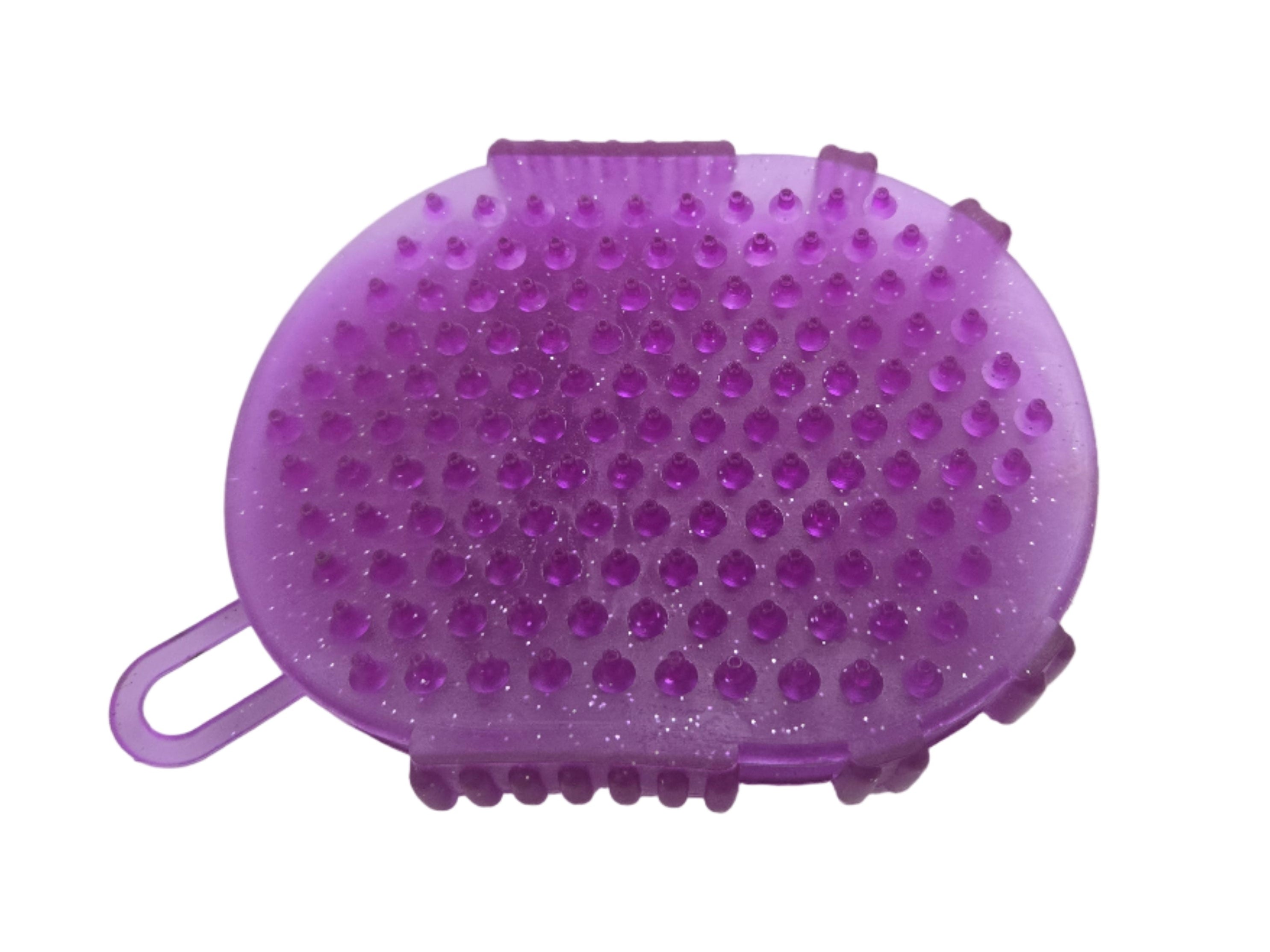 Purple pet grooming brush on a white background